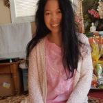 Jendhamuni pink shirt smiling