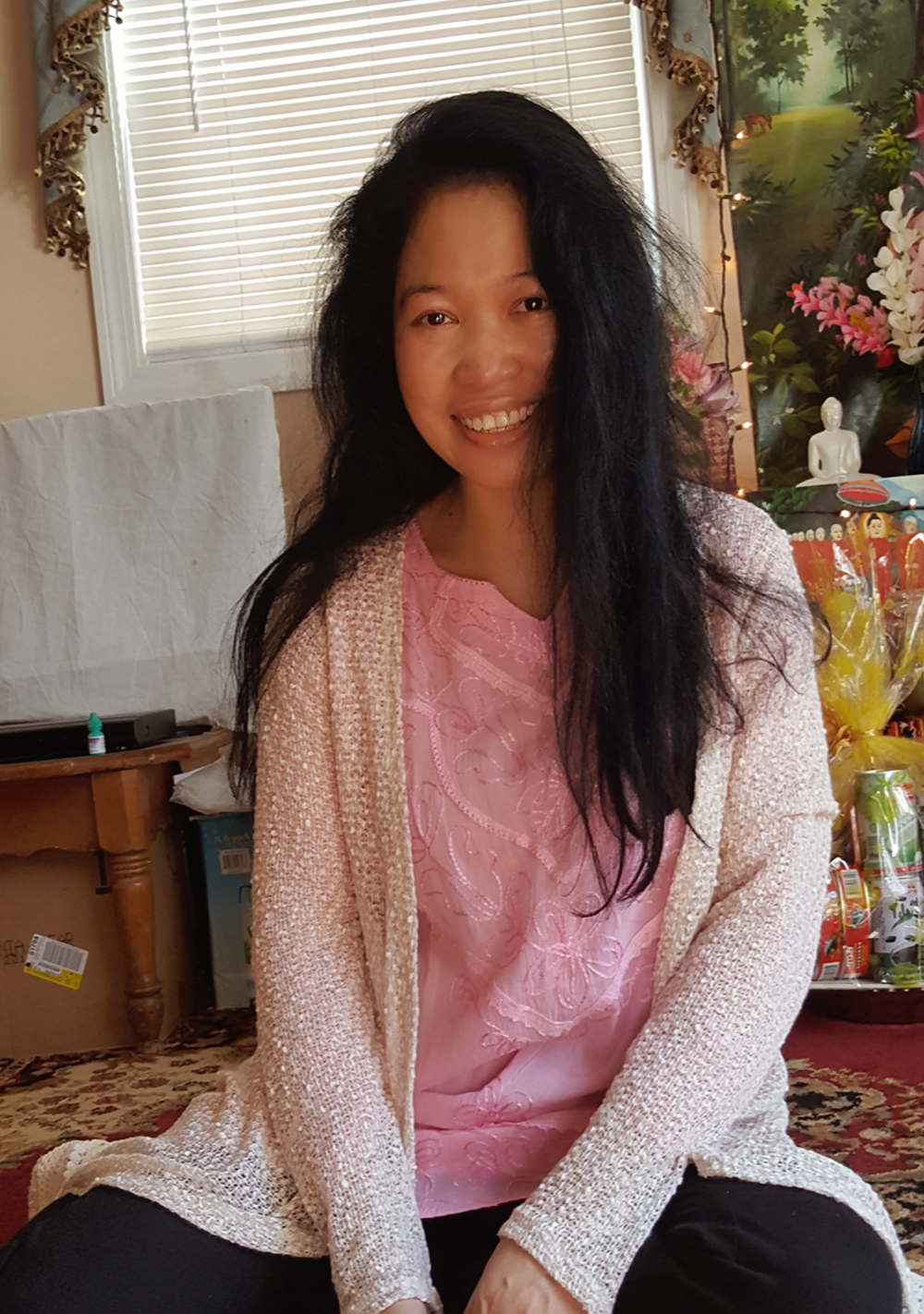 Jendhamuni pink shirt smiling