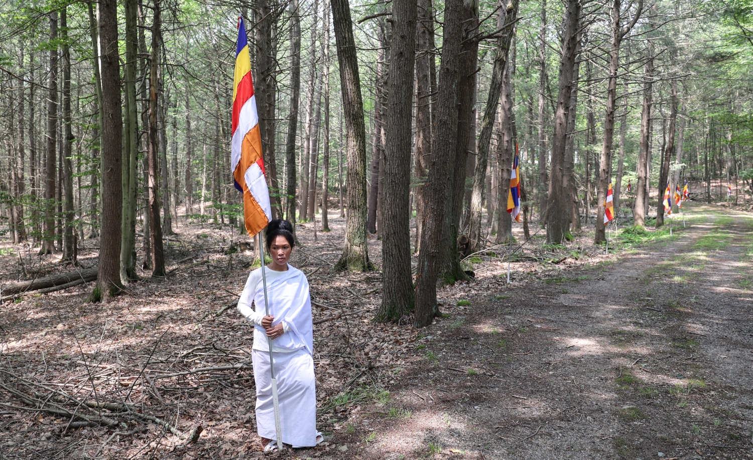 Jendhamuni holding flag at Kiryvongsa on June 29, 2023b Jendhamuni holding flag at Kiryvongsa on June 29, 2023b